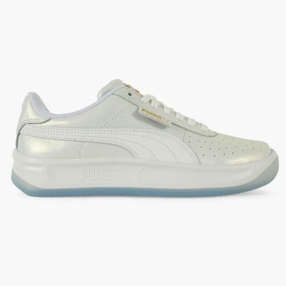 Puma Shoes - Puma white shimmery sneakers.